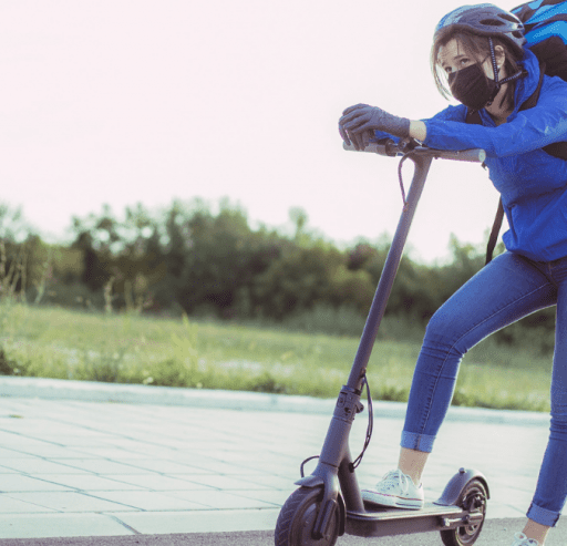 Delivery worker on an electric scooter
