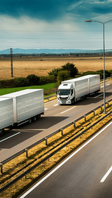 Several trucks driving on the highway
